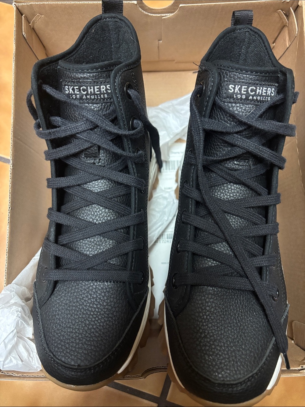 Skechers woman’s Black High-Top Lace-Up Sneakers with White Trim in box